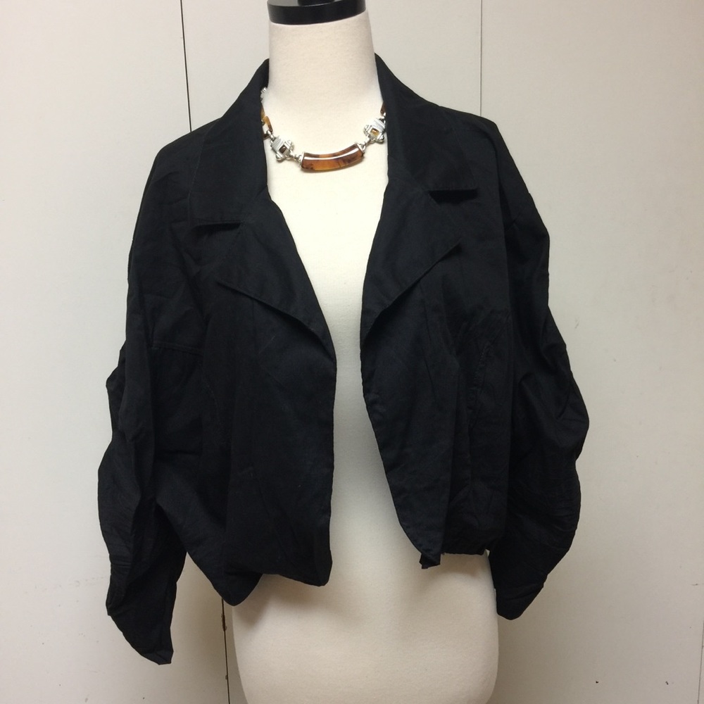 Cute black jacket.  From work to cocktails!